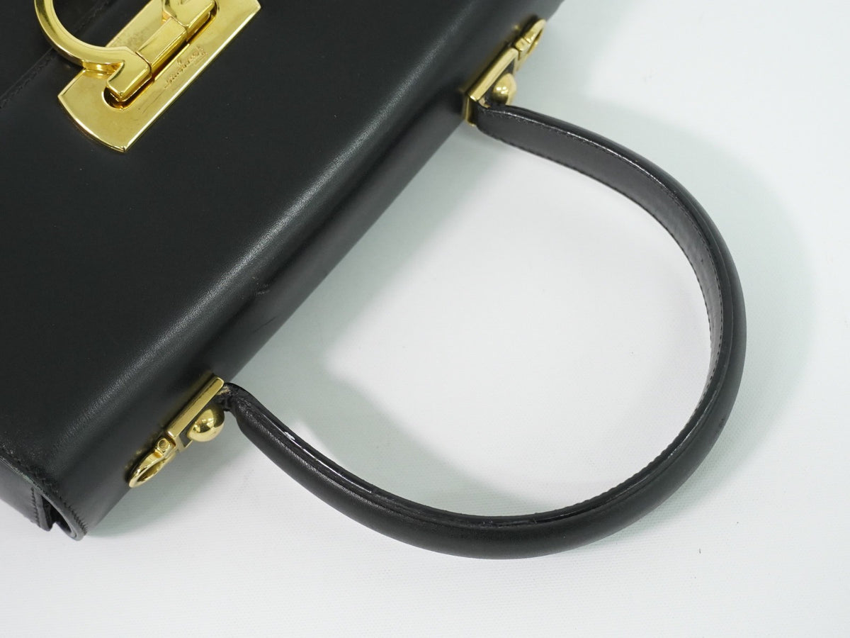 Salvatore Ferragamo Convertible Top Handle Leather Black Leather Handbag (Pre-Owned)