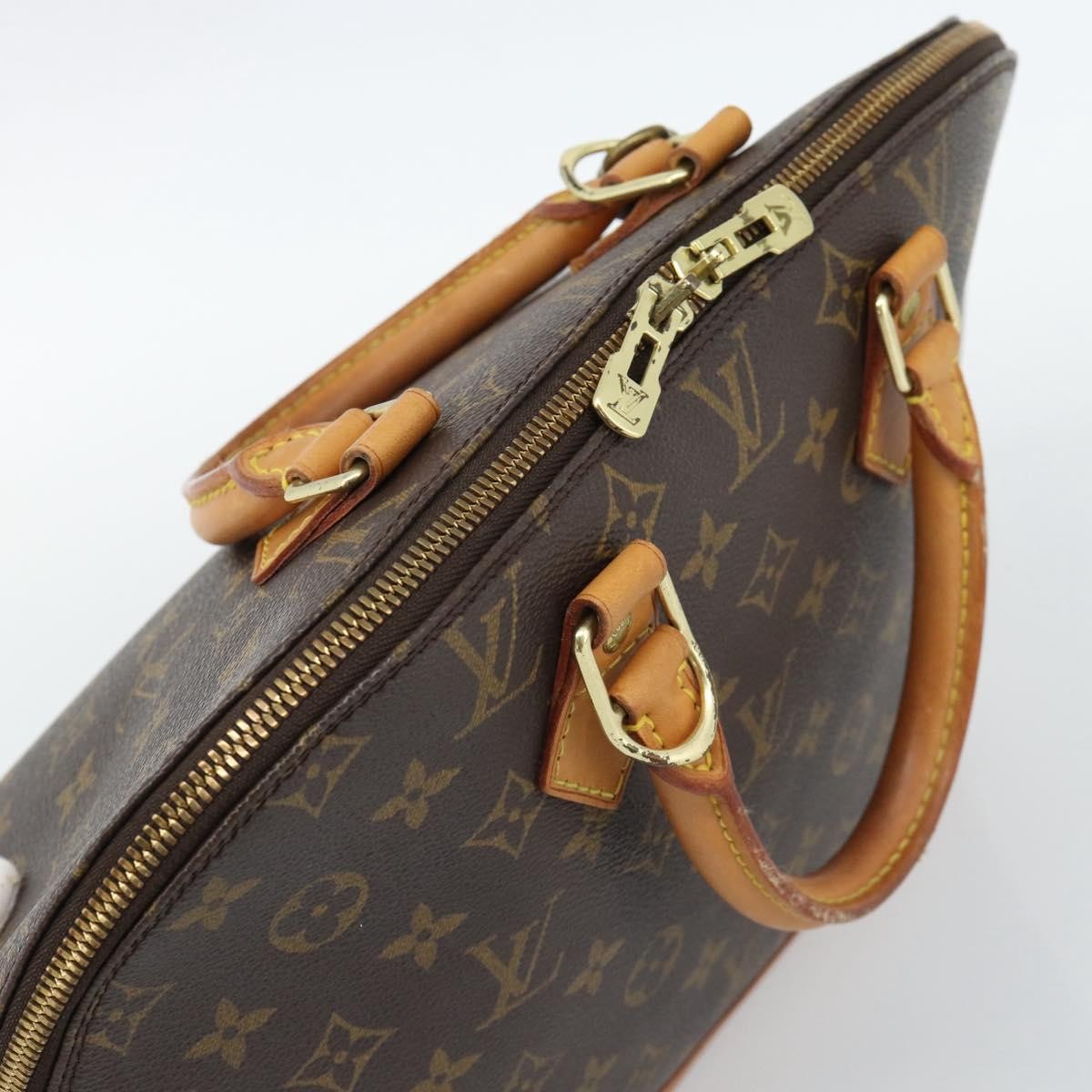 Louis Vuitton Alma Monogram Canvas Brown Canvas Handbag (Pre-Owned)
