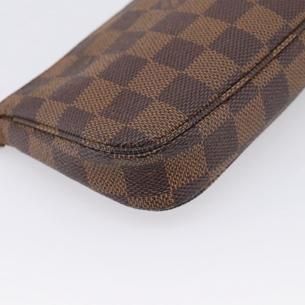 Louis Vuitton Mini Pochette Accessoires Damier Canvas Brown Canvas Clutche & Pouche Bag (Pre-Owned)