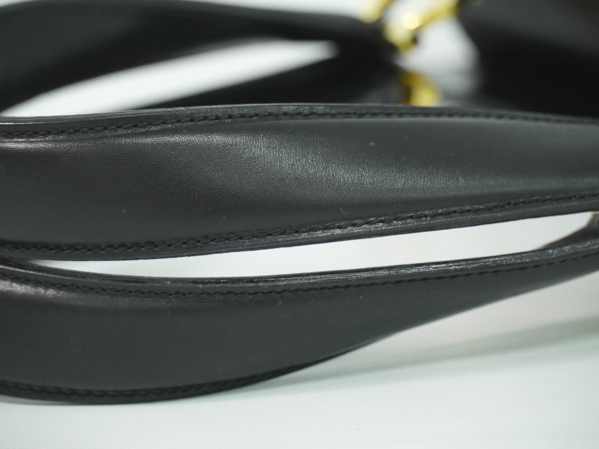 Salvatore Ferragamo Gancini Top Handle Leather Black Leather Handbag (Pre-Owned)