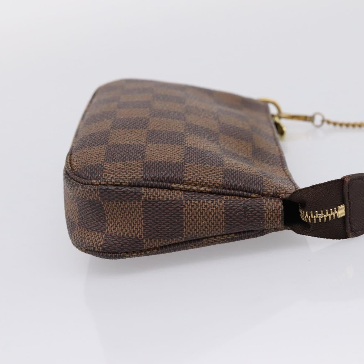Louis Vuitton Mini Pochette Accessoires Damier Canvas Brown Canvas Clutche & Pouche Bag (Pre-Owned)
