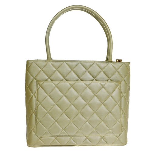 Chanel Matelassé Gold Leather Handbag (Pre-Owned)