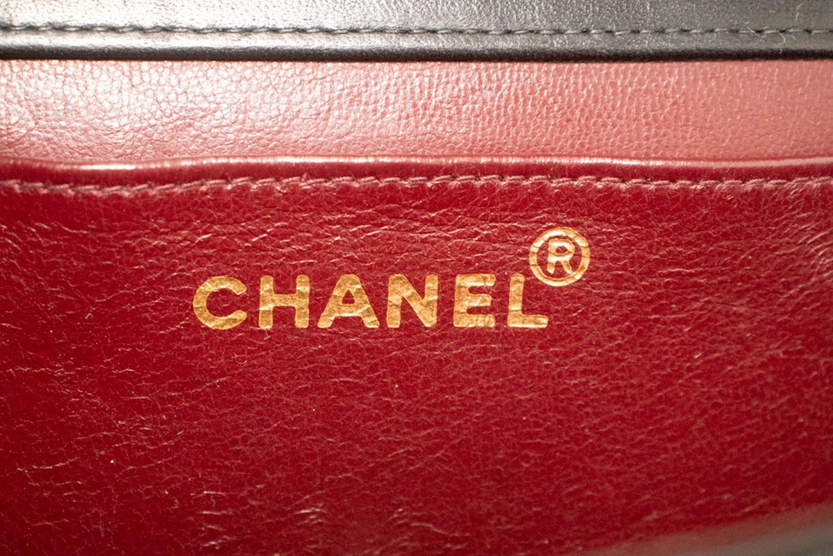 Chanel Vintage Full Flap Quilted Lambskin Black Leather Handbag (Pre-Owned)