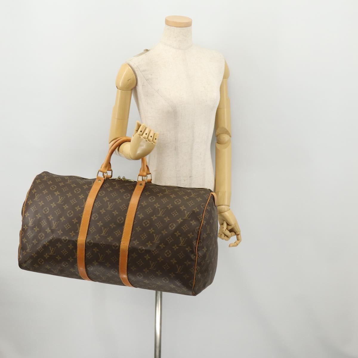 Louis Vuitton Keepall Monogram Canvas Brown Canvas Travel Bag Bag (Pre-Owned)
