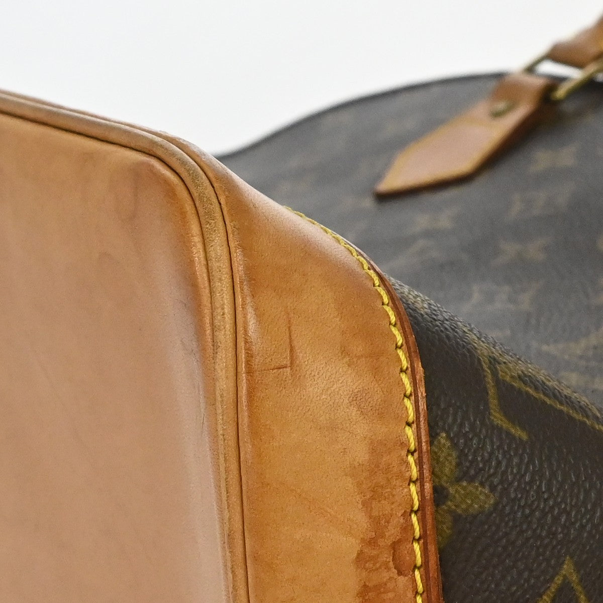 Louis Vuitton Alma Monogram Brown Canvas Handbag (Pre-Owned)