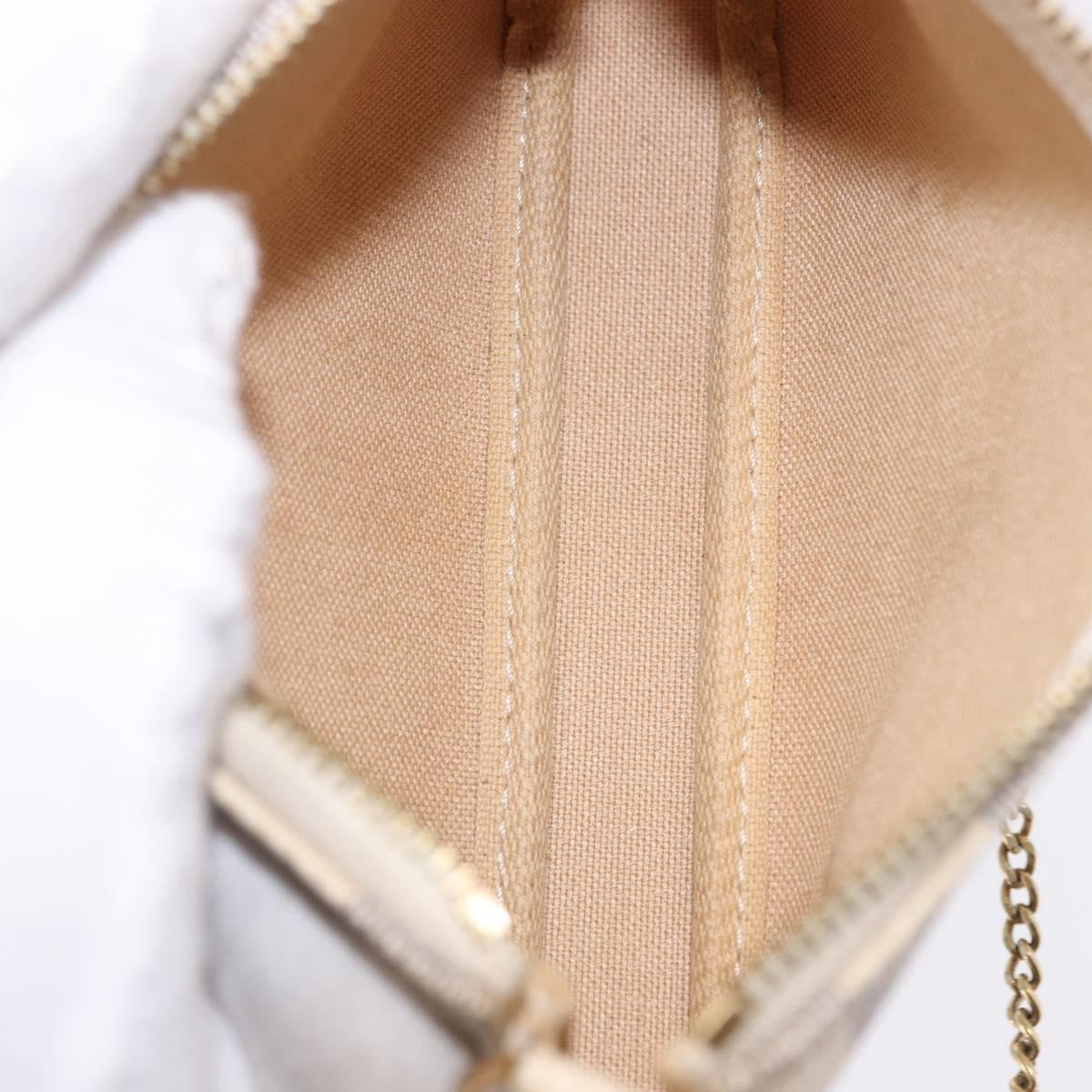 Louis Vuitton Mini Pochette Accessoires Damier Canvas Beige Canvas Clutche & Pouche Bag (Pre-Owned)