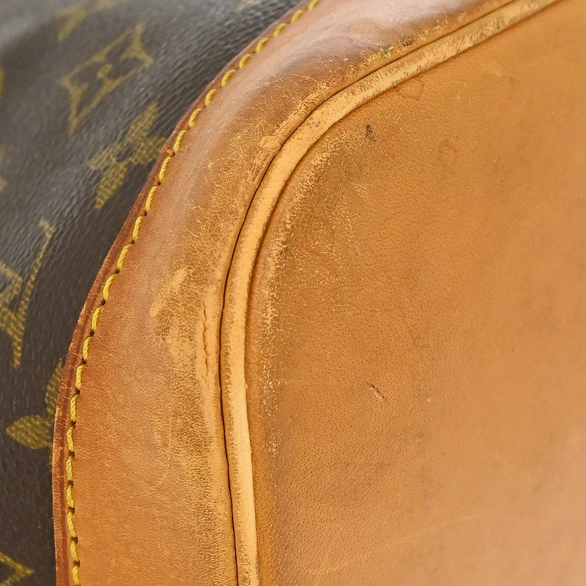 Louis Vuitton Alma Monogram Brown Canvas Handbag (Pre-Owned)