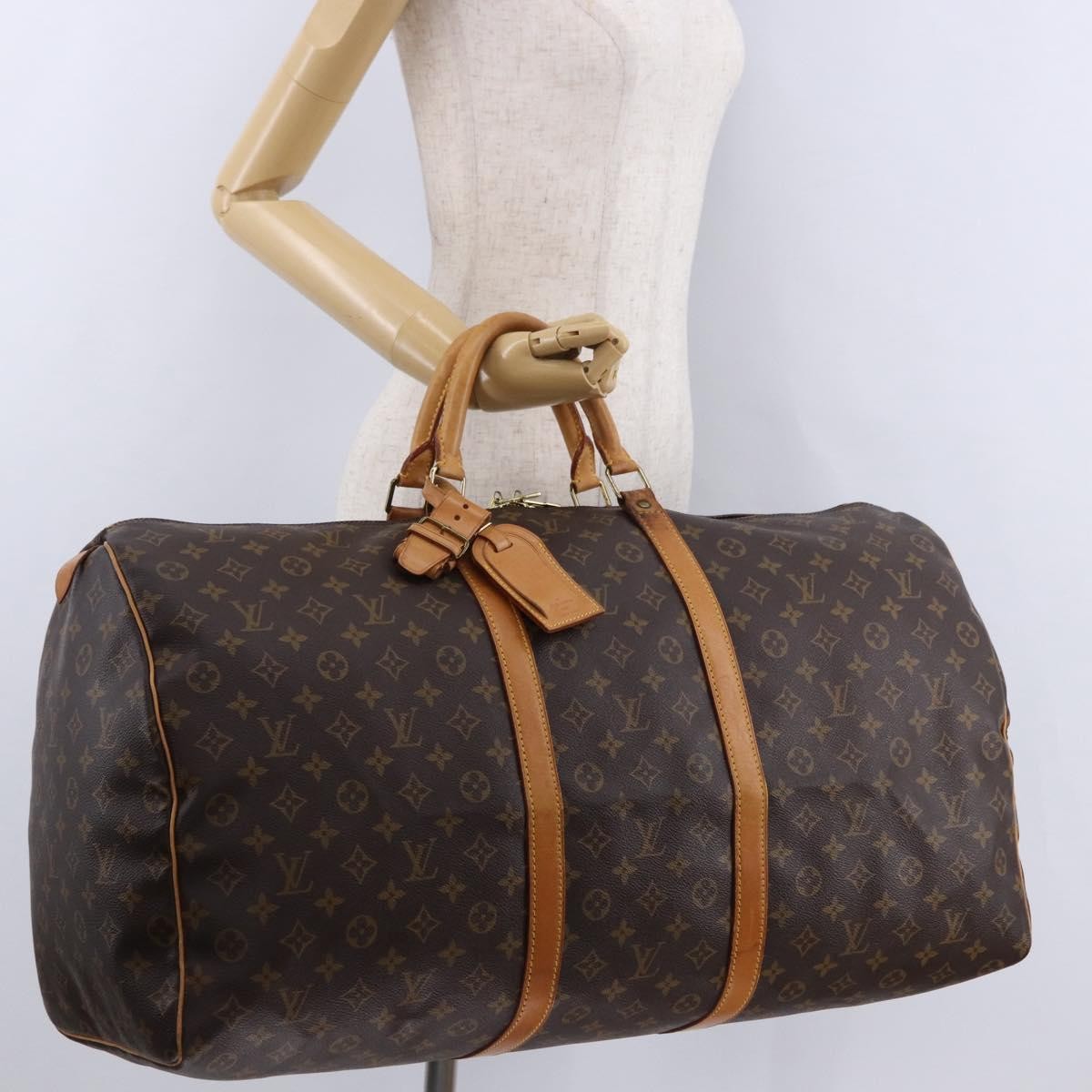 Louis Vuitton Keepall Monogram Brown Canvas Travel Bag Bag (Pre-Owned)