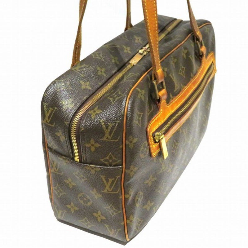 Louis Vuitton Cité Brown Canvas Handbag (Pre-Owned)