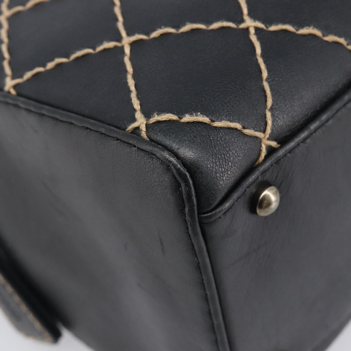 Chanel Surpique Boston Quilted Leather Black Leather Handbag (Pre-Owned)