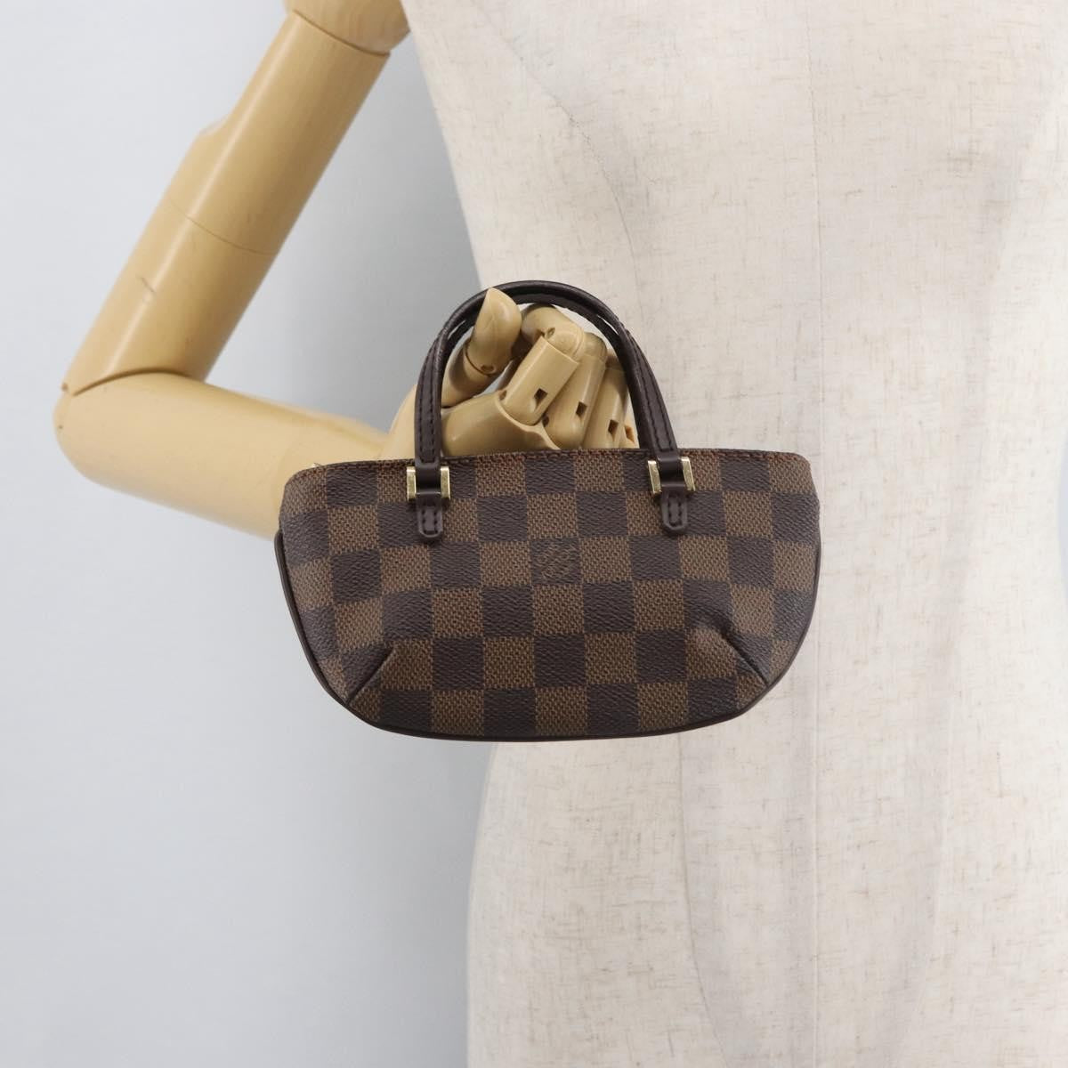 Louis Vuitton Manosque Pochette Damier Ebene Brown Canvas Clutche & Pouche Bag (Pre-Owned)