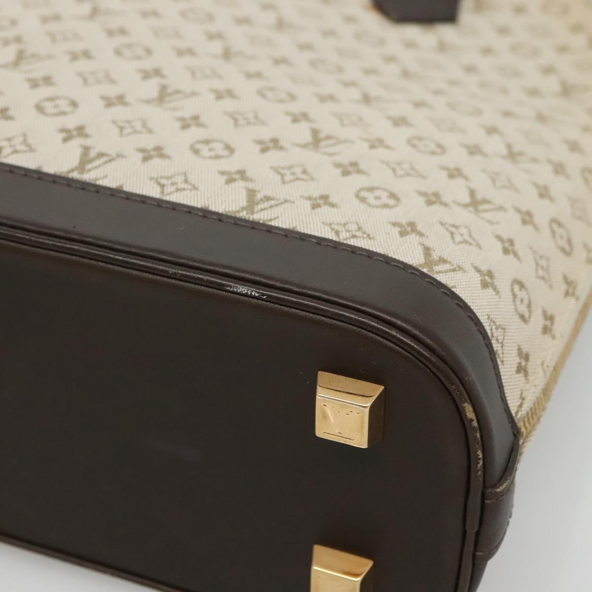 Louis Vuitton Alma Mini Lin Monogram Khaki Canvas Handbag (Pre-Owned)