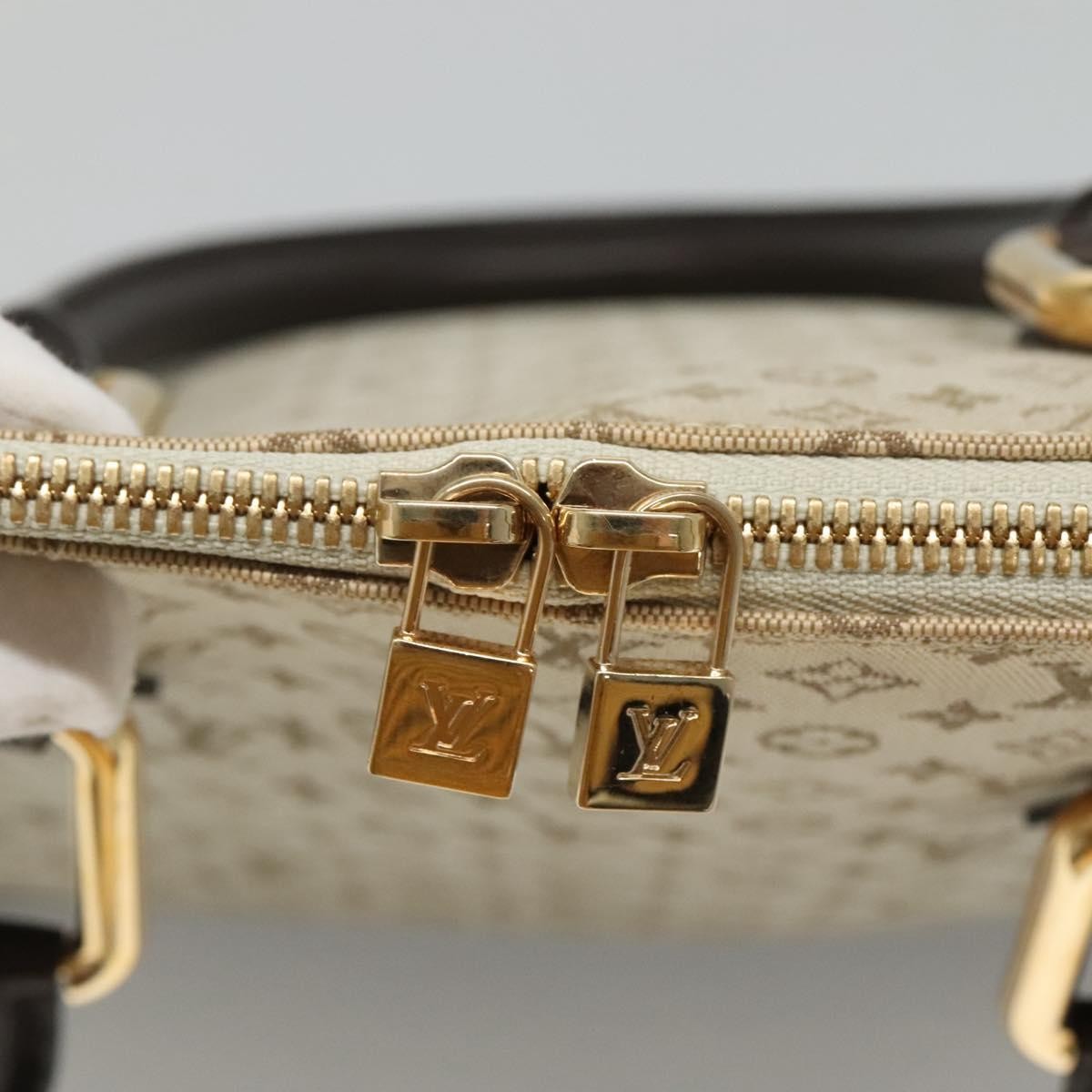 Louis Vuitton Alma Mini Lin Monogram Khaki Canvas Handbag (Pre-Owned)
