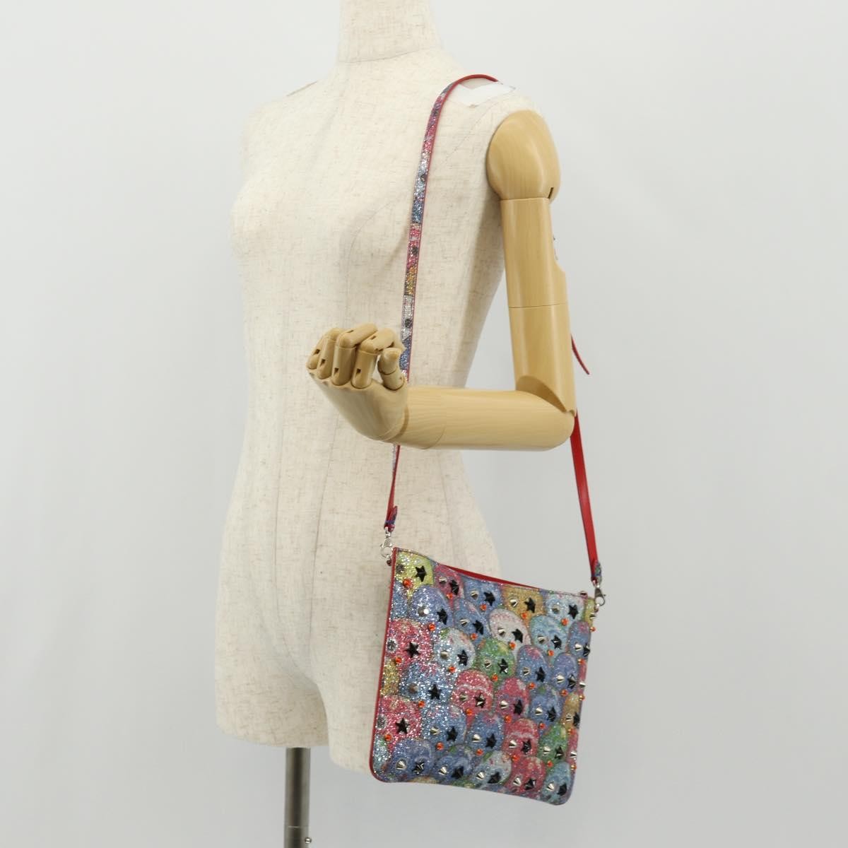 Christian Louboutin Loubiclutch Spiked Printed Leather Red Canvas Shoulder Bag Bag (Pre-Owned)