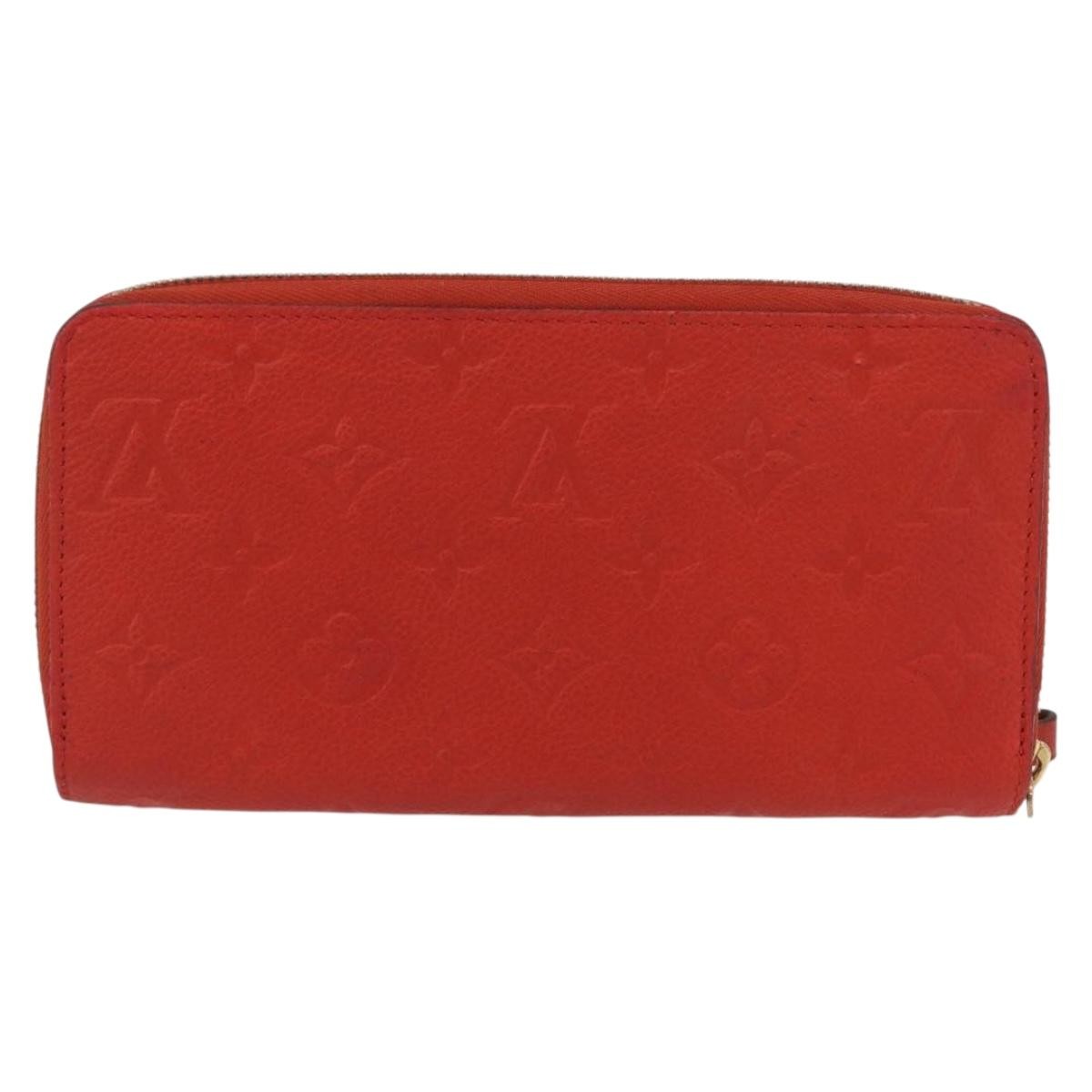 Louis Vuitton Portefeuille Zippy Monogramme Empreinte Monogramme Empreinte Orange Leather Wallets Accessory (Pre-Owned)