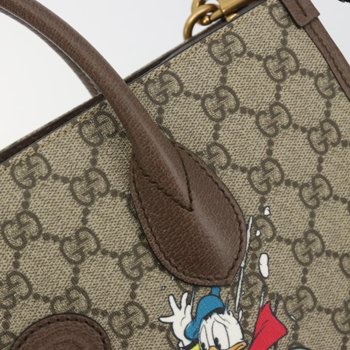 Gucci Disney Donald Duck Convertible Printed Gg Coated Canvas Beige Canvas Tote Bag Bag (Pre-Owned)