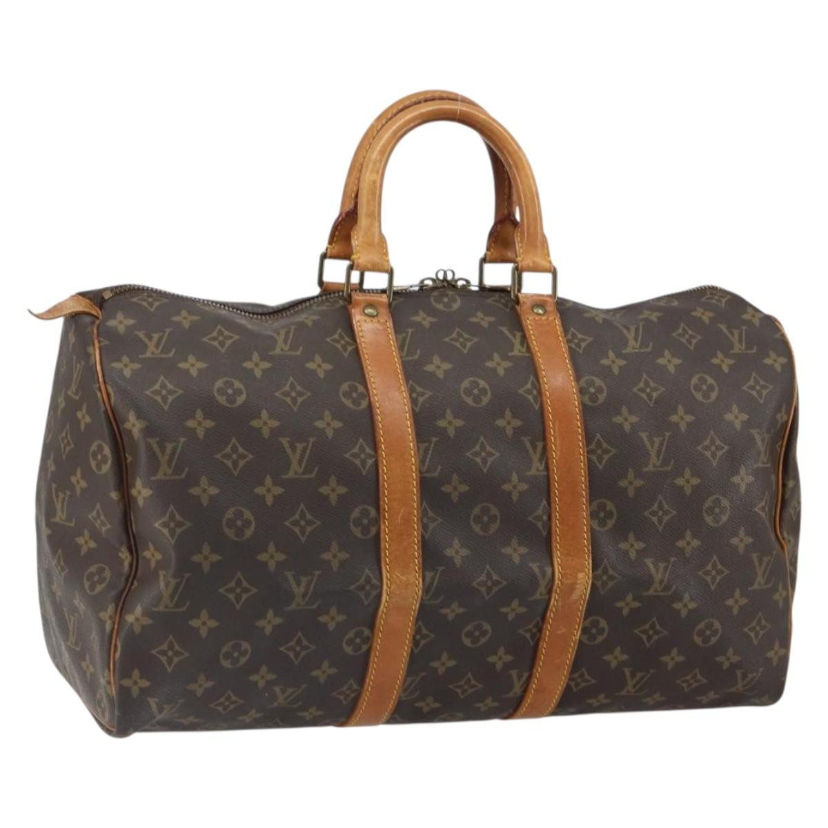 Louis Vuitton Keepall Monogram Canvas Brown Canvas Travel Bag Bag (Pre-Owned)