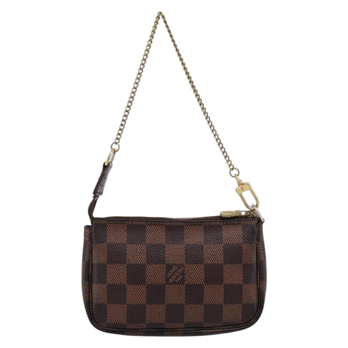 Louis Vuitton Mini Pochette Accessoires Damier Canvas Brown Canvas Clutche & Pouche Bag (Pre-Owned)