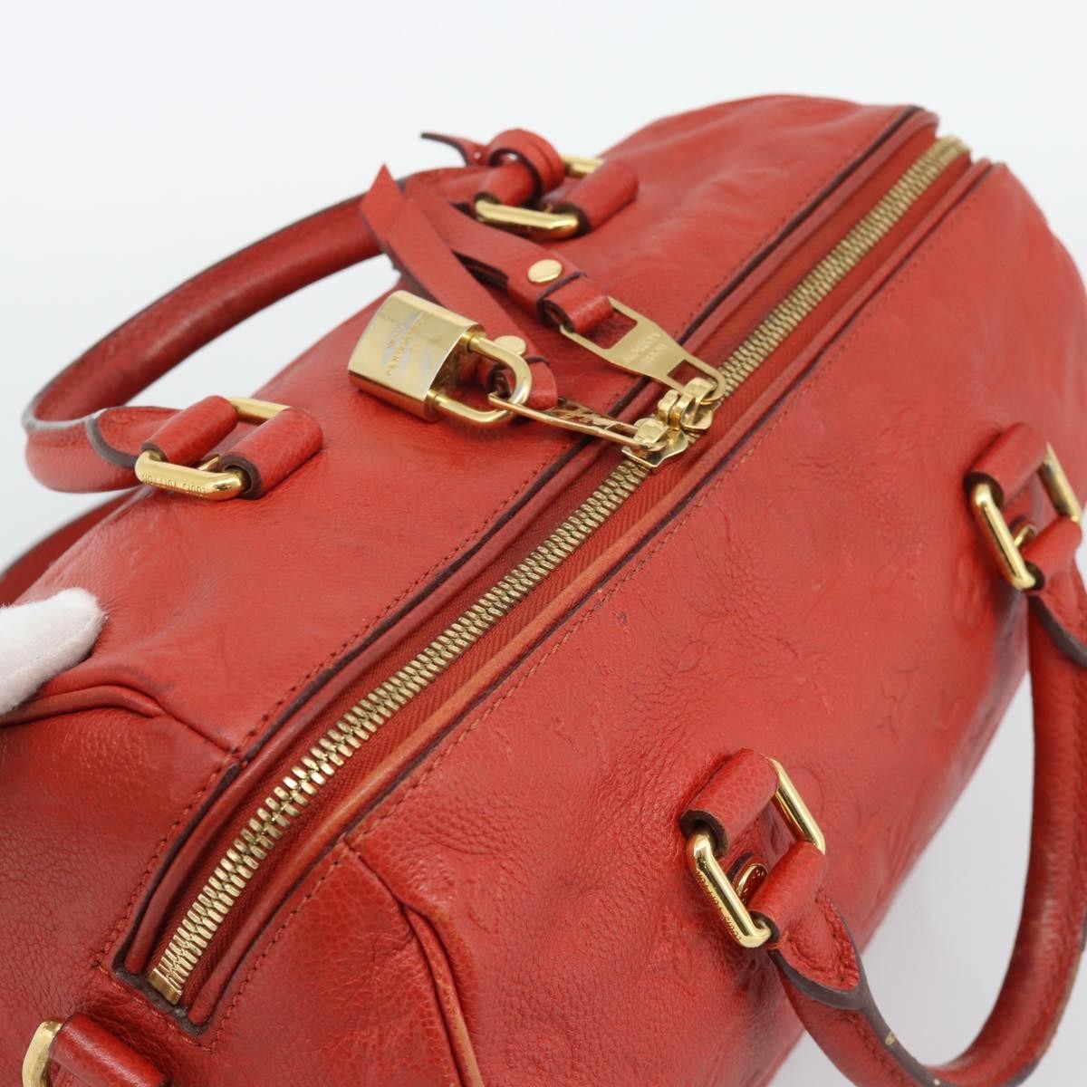 Louis Vuitton Speedy Bandouliere Monogram Empreinte Leather Red Leather Handbag (Pre-Owned)