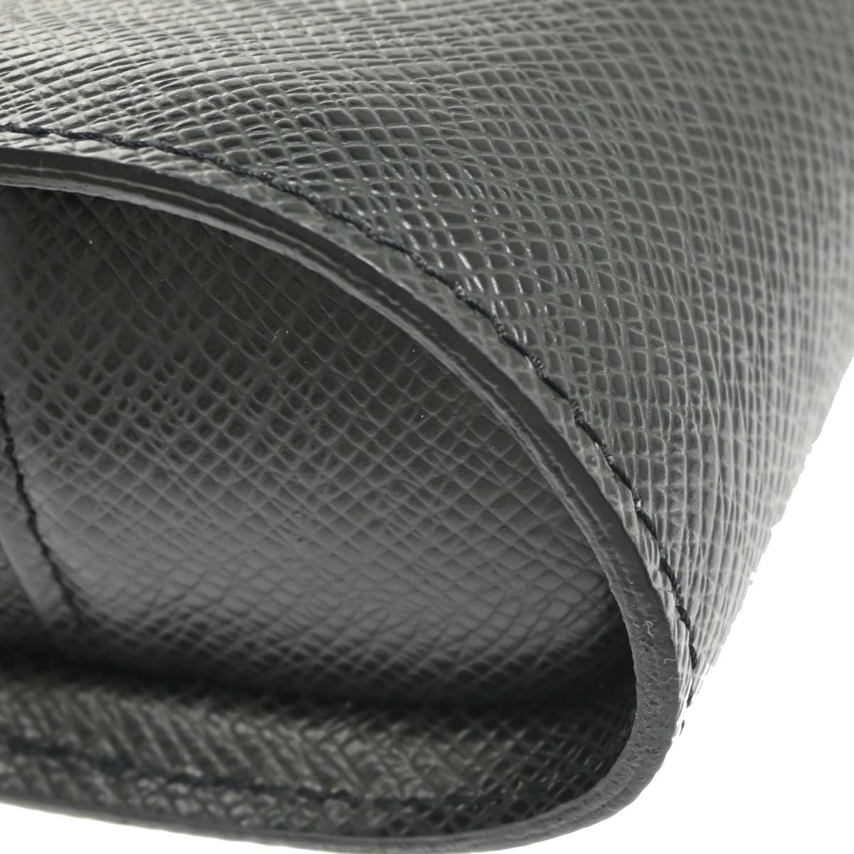 Louis Vuitton Pochette Baikal Clutch Taiga Leather Black Leather Clutche & Pouche Bag (Pre-Owned)