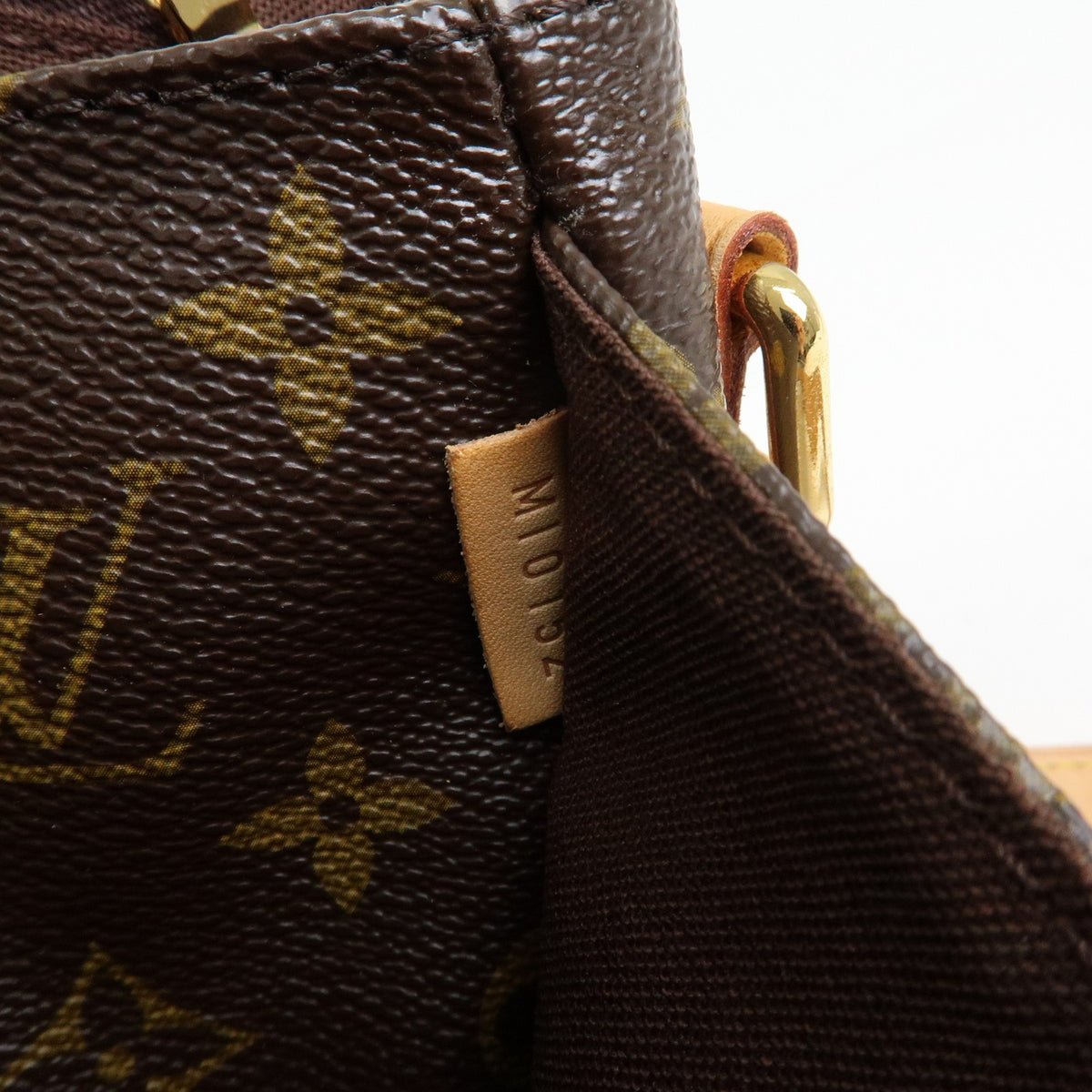 Louis Vuitton Menilmontant Monogram Canvas Brown Canvas Handbag (Pre-Owned)