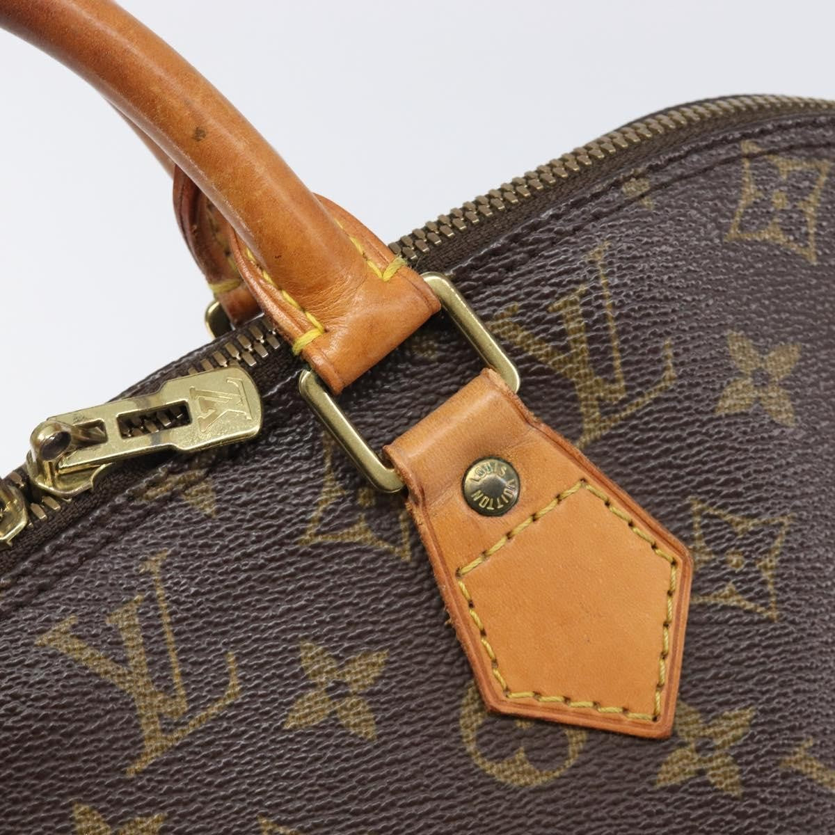 Louis Vuitton Alma Monogram Canvas Brown Canvas Handbag (Pre-Owned)