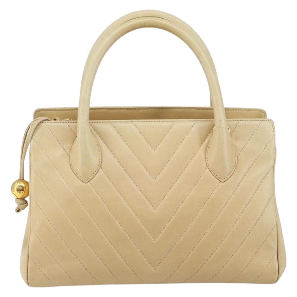Chanel V Stitch Leather Beige Leather Handbag (Pre-Owned)