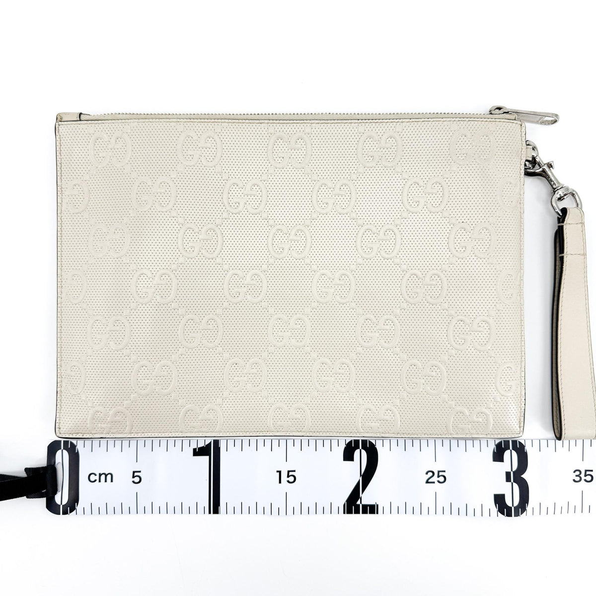 Gucci Wristlet Gg Embossed Perforated Leather White Leather Clutche & Pouche Bag (Pre-Owned)