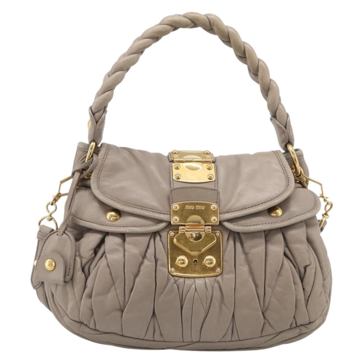 Miu Miu Coffer Hobo Matelasse Leather Beige Leather Handbag (Pre-Owned)