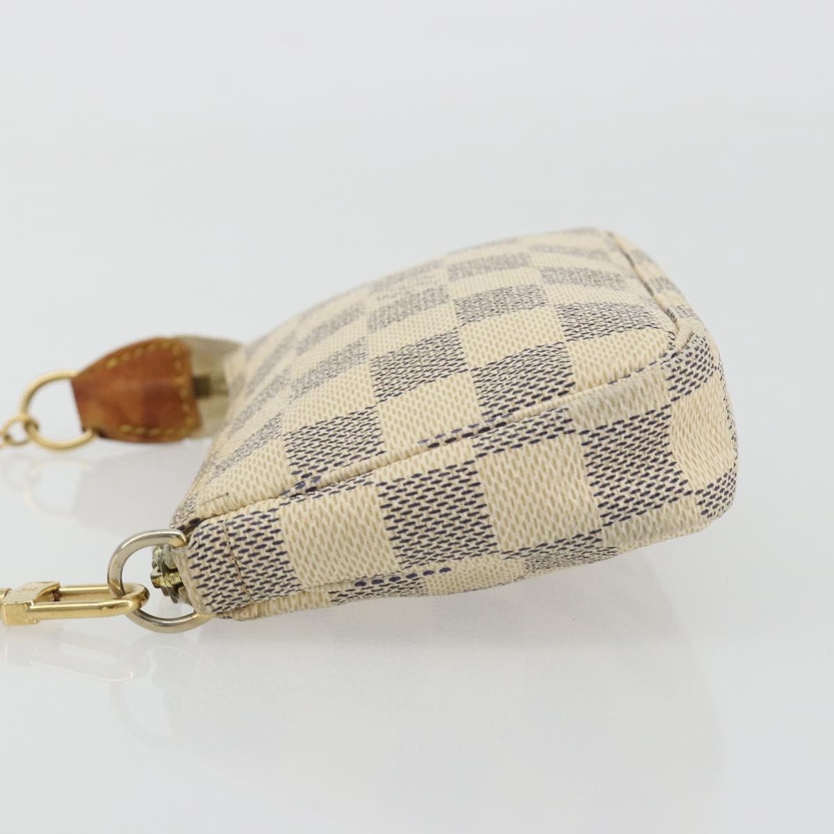 Louis Vuitton Mini Pochette Accessoires Damier Canvas Beige Canvas Clutche & Pouche Bag (Pre-Owned)