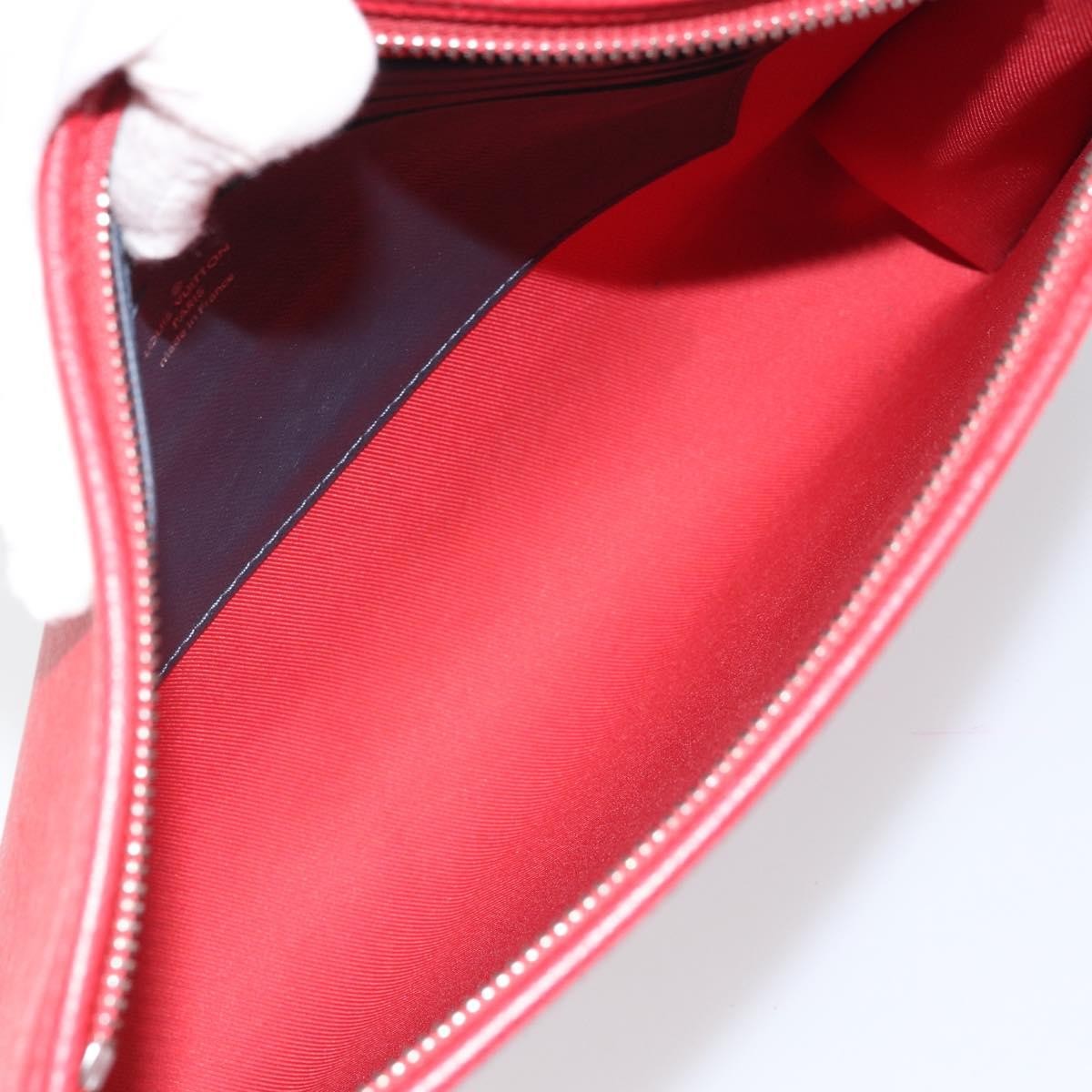 Louis Vuitton Pochette Voyage Taiga Leather Red Leather Clutche & Pouche Bag (Pre-Owned)