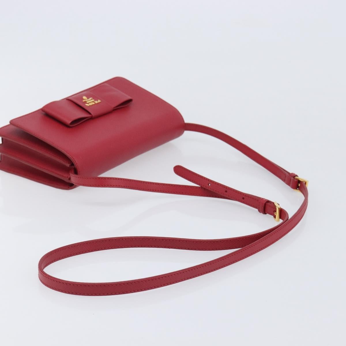 Prada Bow Wallet On Strap Saffiano Leather Red Leather Crossbody Bag Bag (Pre-Owned)