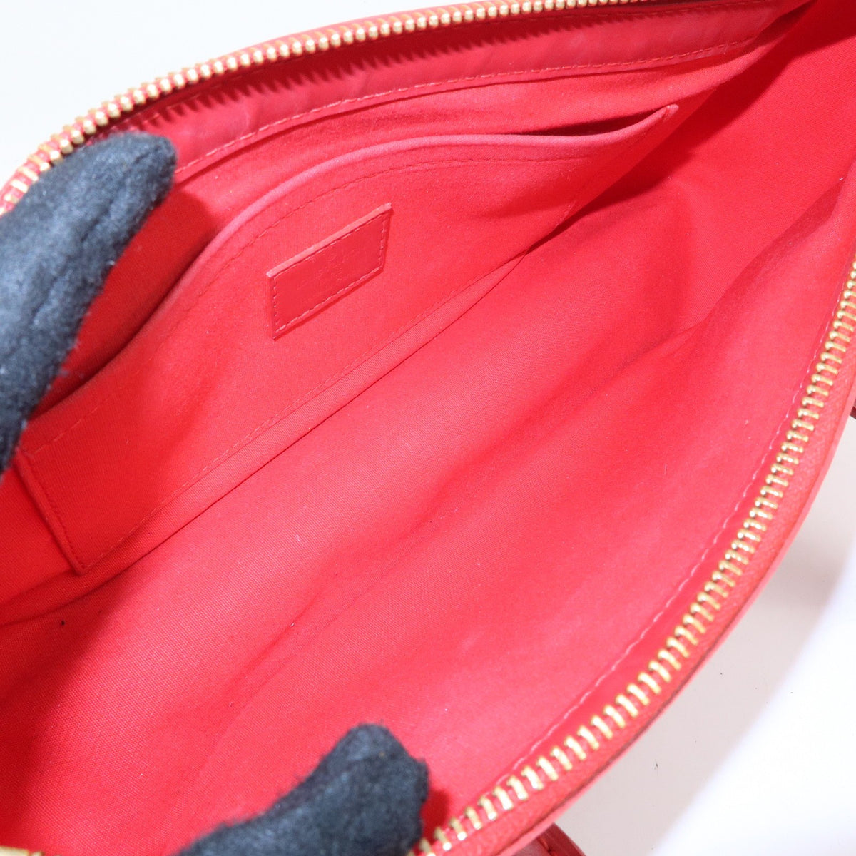 Louis Vuitton Dhanura Epi Leather Red Leather Handbag (Pre-Owned)