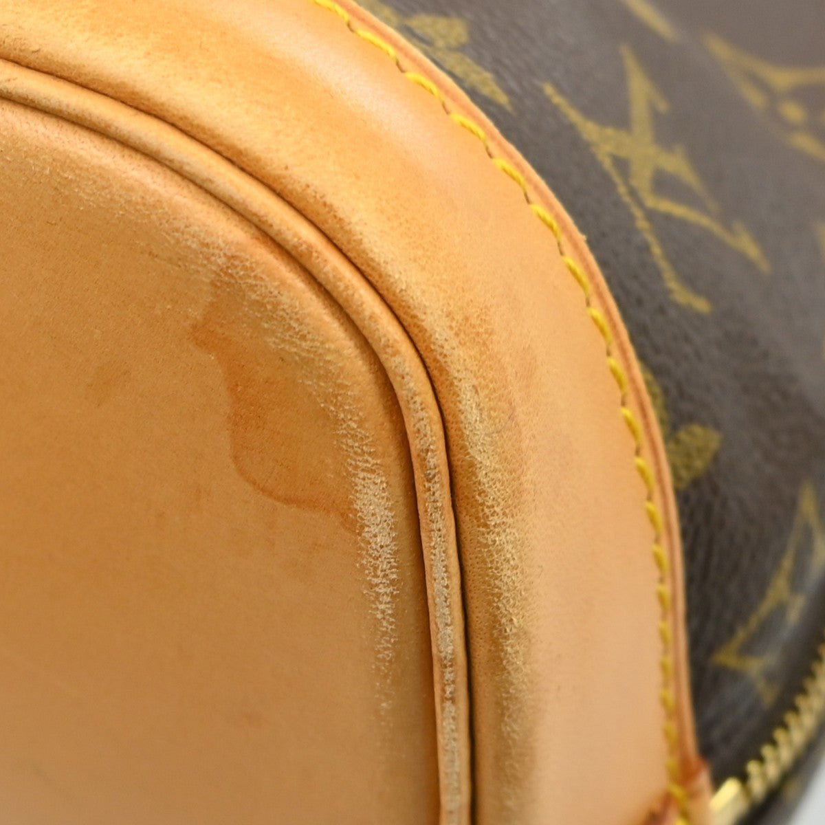 Louis Vuitton Alma Monogram Brown Canvas Handbag (Pre-Owned)