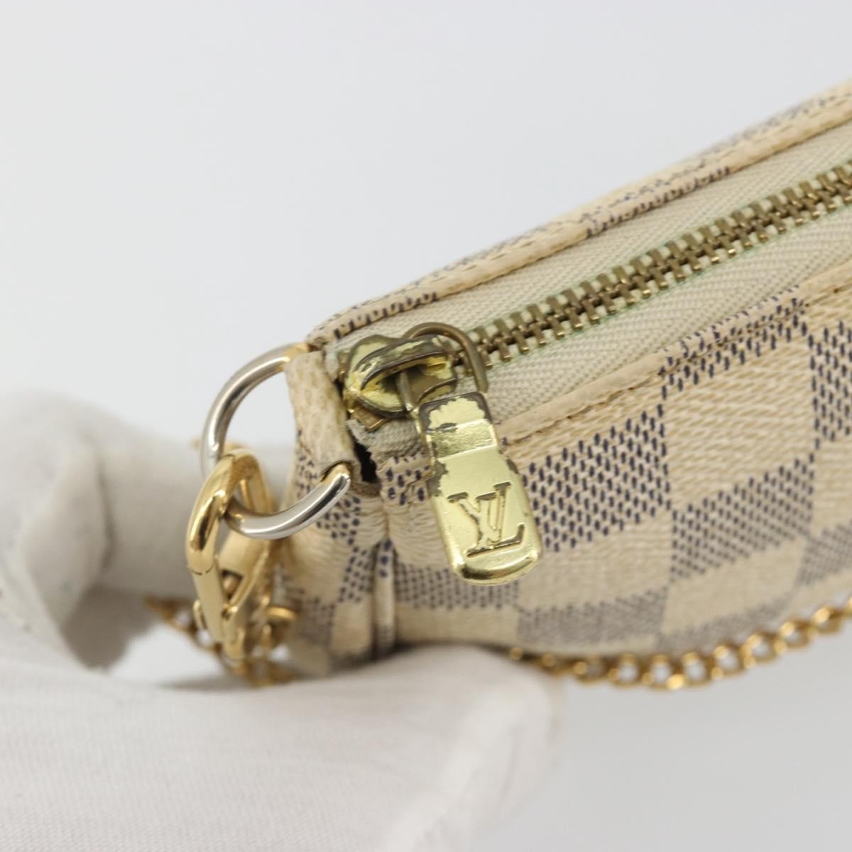 Louis Vuitton Mini Pochette Accessoires Damier Canvas Beige Canvas Clutche & Pouche Bag (Pre-Owned)