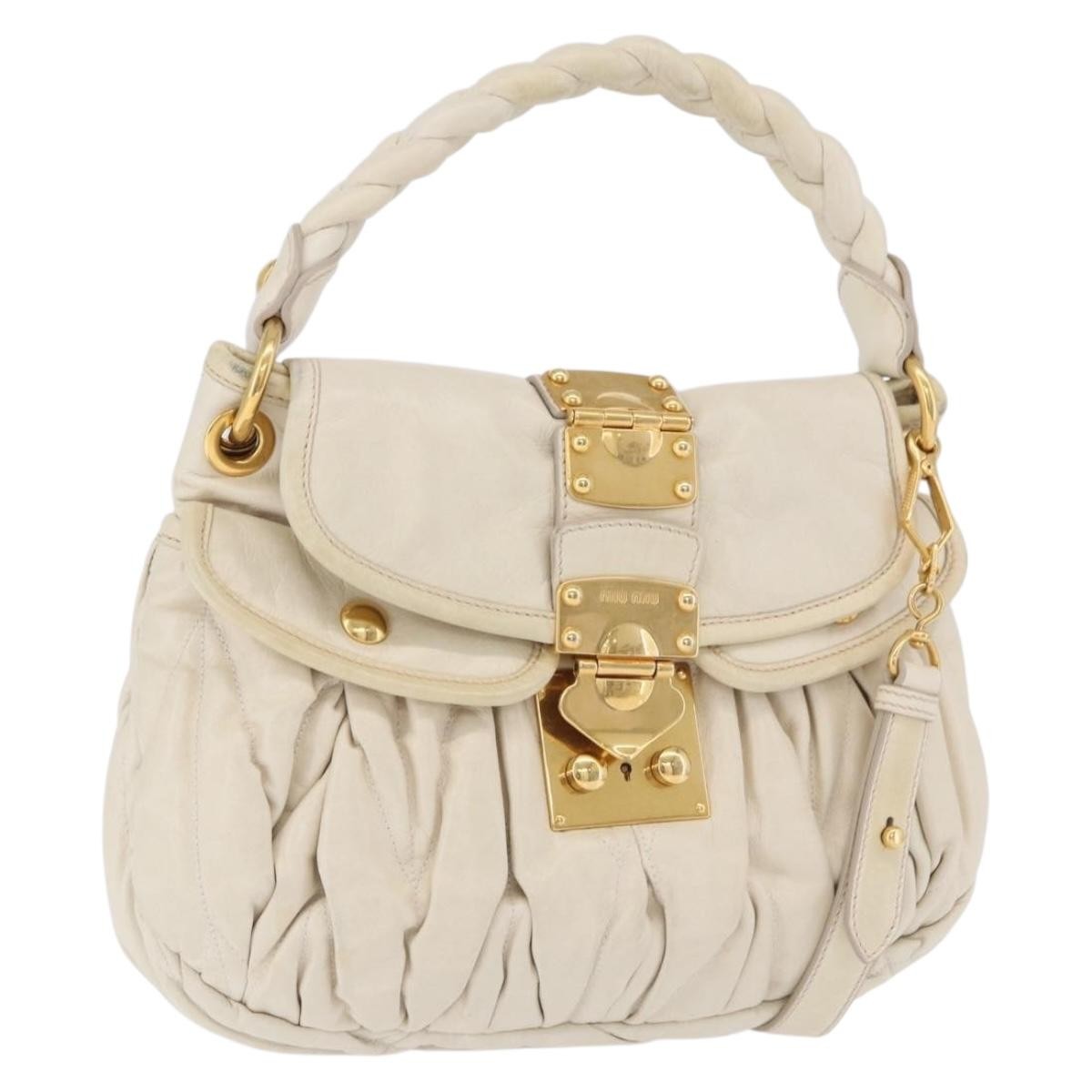 Miu Miu Coffer Hobo Matelasse Leather Beige Leather Handbag (Pre-Owned)