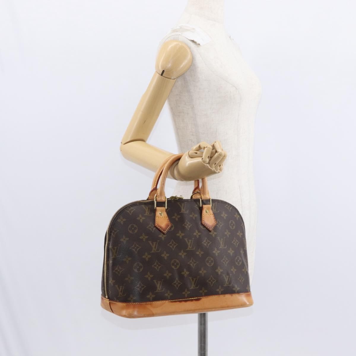 Louis Vuitton Alma Monogram Canvas Brown Canvas Handbag (Pre-Owned)