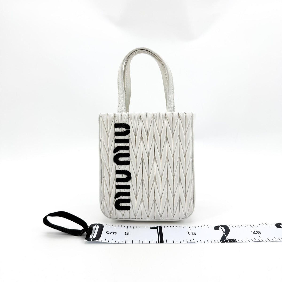 Miu Miu Matelassé Nappa Leather Top Handle Bag Leather White Leather Clutche & Pouche Bag (Pre-Owned)