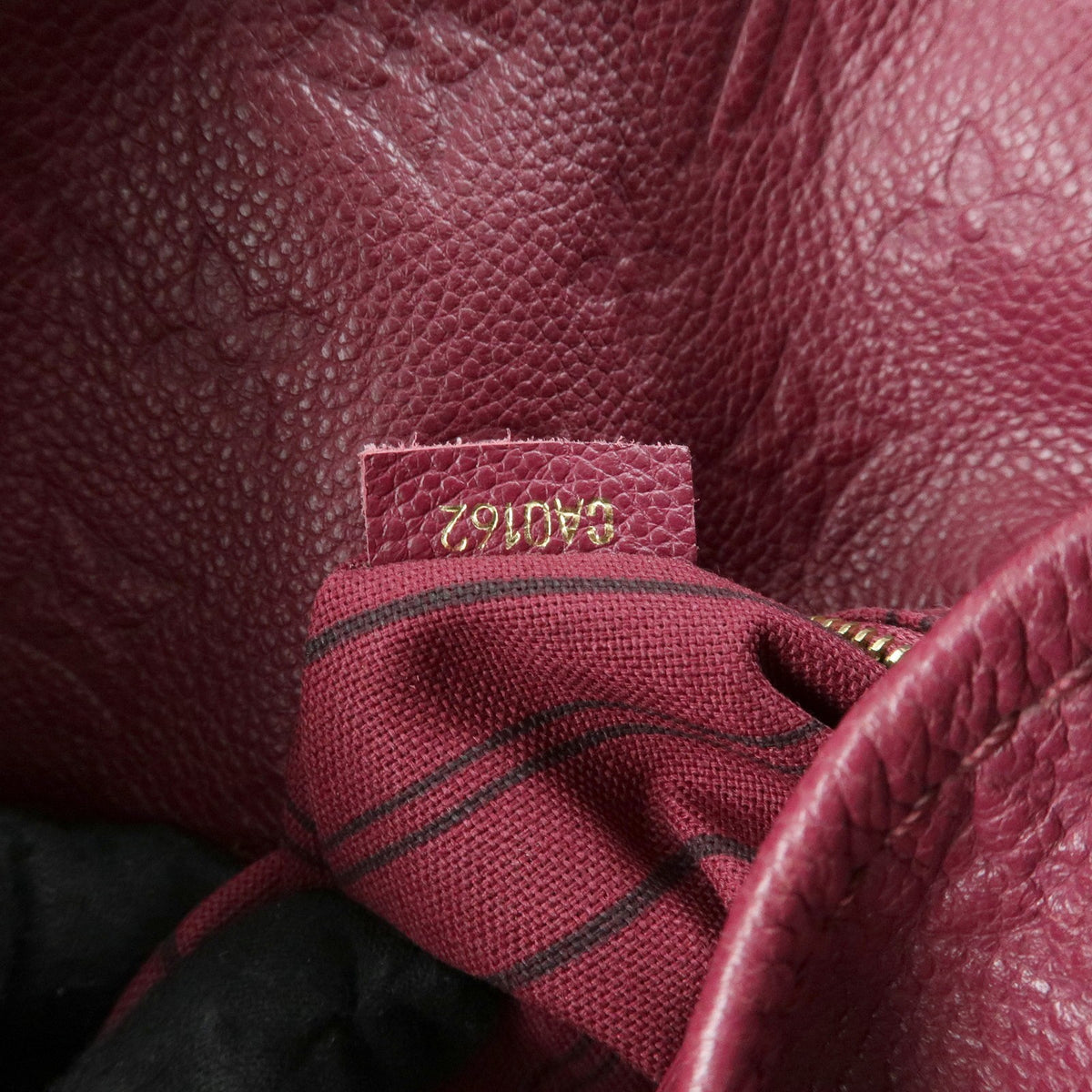 Louis Vuitton Artsy Monogram Empreinte Leather Burgundy Leather Handbag (Pre-Owned)