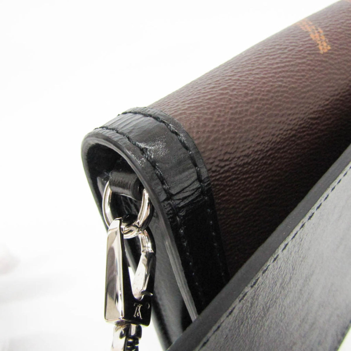 Louis Vuitton Dauphine Bumbag Reverse Monogram Giant Brown Canvas Crossbody Bag Bag (Pre-Owned)