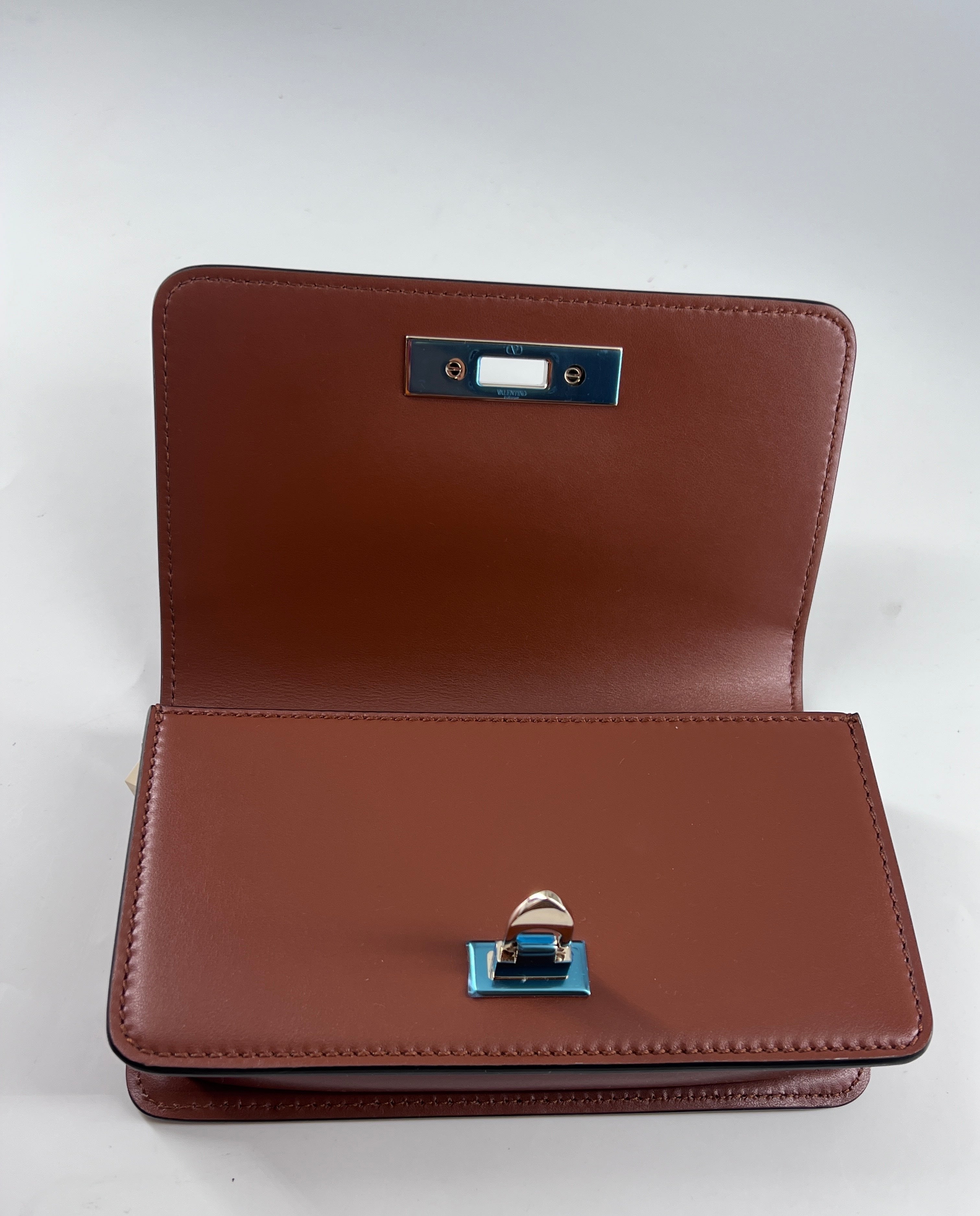 Valentino Garavani Rockstud Flip Lock Flap Bag Leather Brown Leather Bag (Pre-Owned)