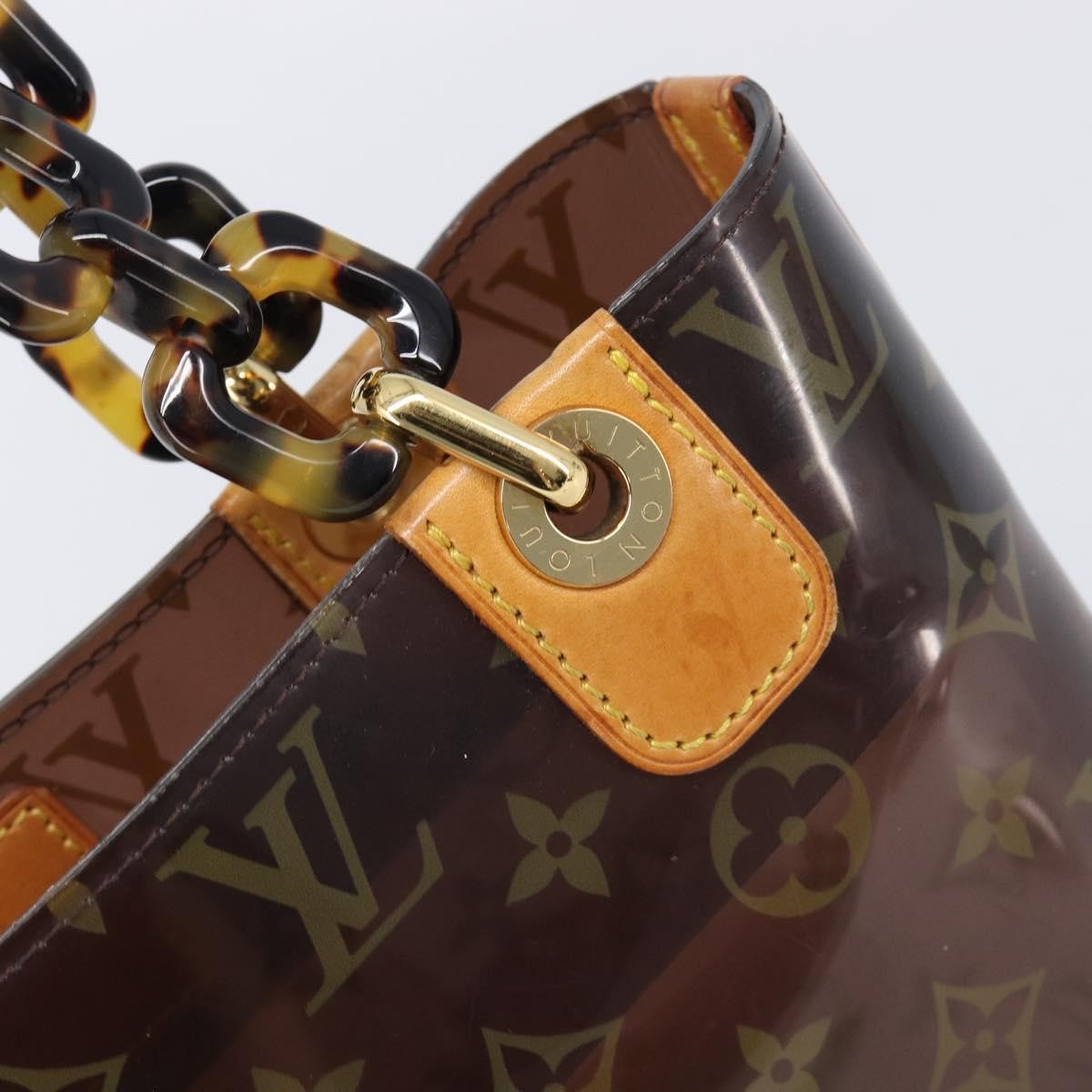 Louis Vuitton Sac Ambre Monogram Vinyl Brown Plastic Handbag (Pre-Owned)