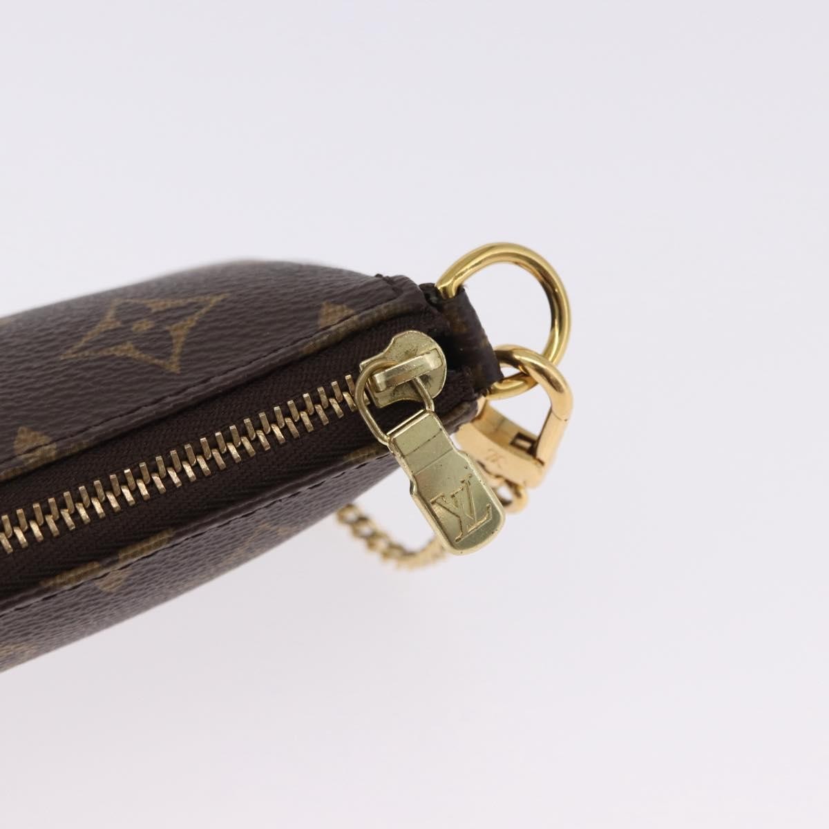 Louis Vuitton Mini Pochette Accessoires Canvas Brown Canvas Clutche & Pouche Bag (Pre-Owned)
