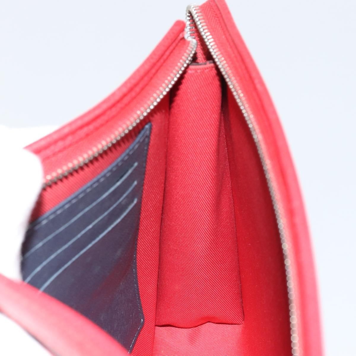 Louis Vuitton Pochette Voyage Taiga Leather Red Leather Clutche & Pouche Bag (Pre-Owned)