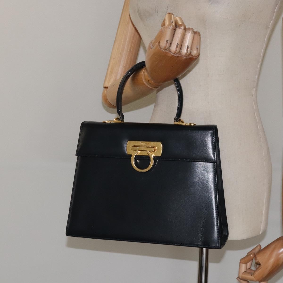 Salvatore Ferragamo Convertible Top Handle Leather Black Leather Handbag (Pre-Owned)