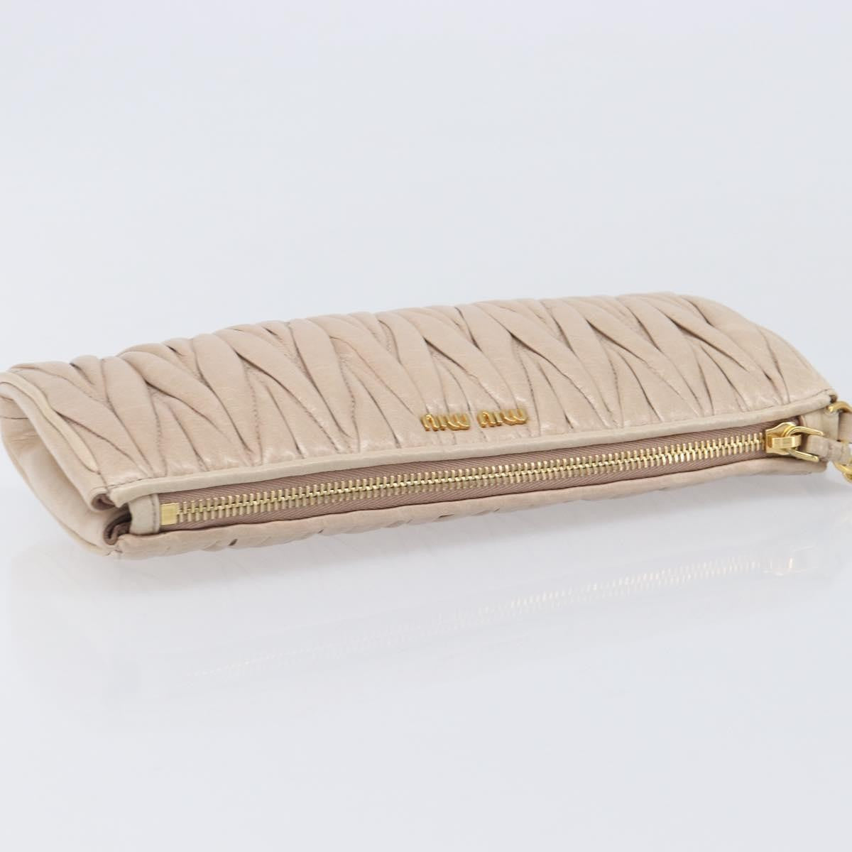 Miu Miu Zip Wristlet Matelasse Leather Beige Leather Clutche & Pouche Bag (Pre-Owned)