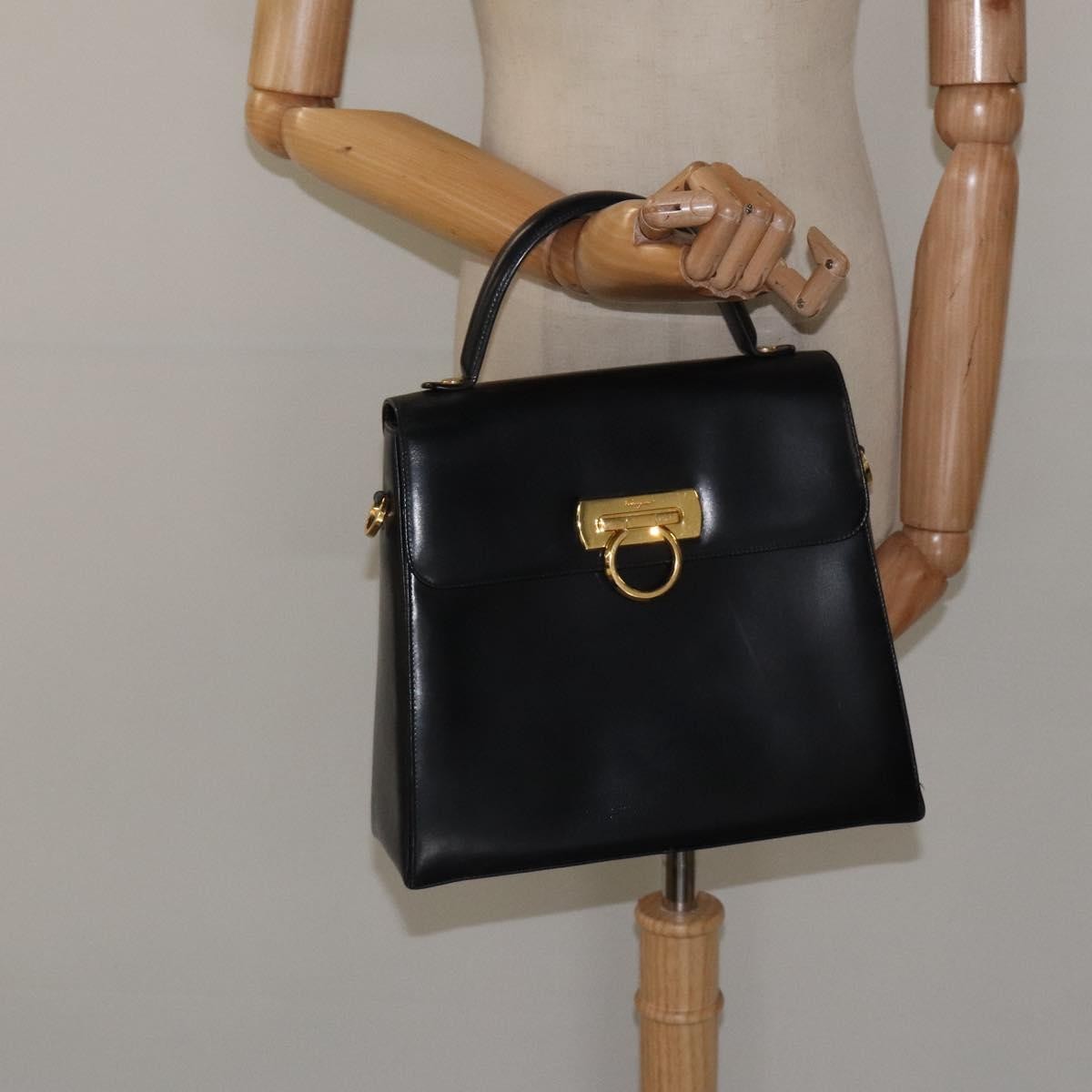Salvatore Ferragamo Convertible Top Handle Leather Black Leather Handbag (Pre-Owned)