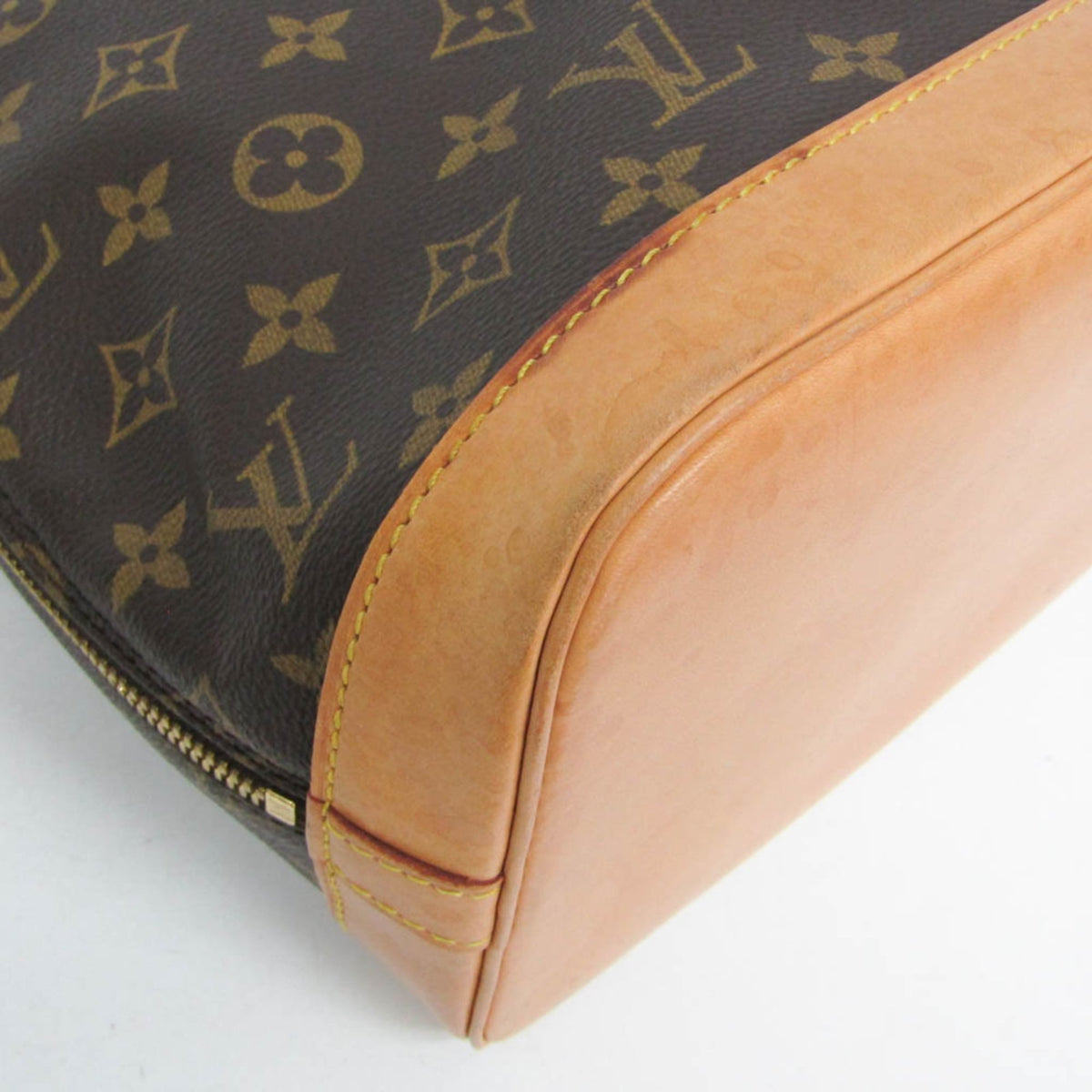 Louis Vuitton Alma Monogram Brown Canvas Handbag (Pre-Owned)
