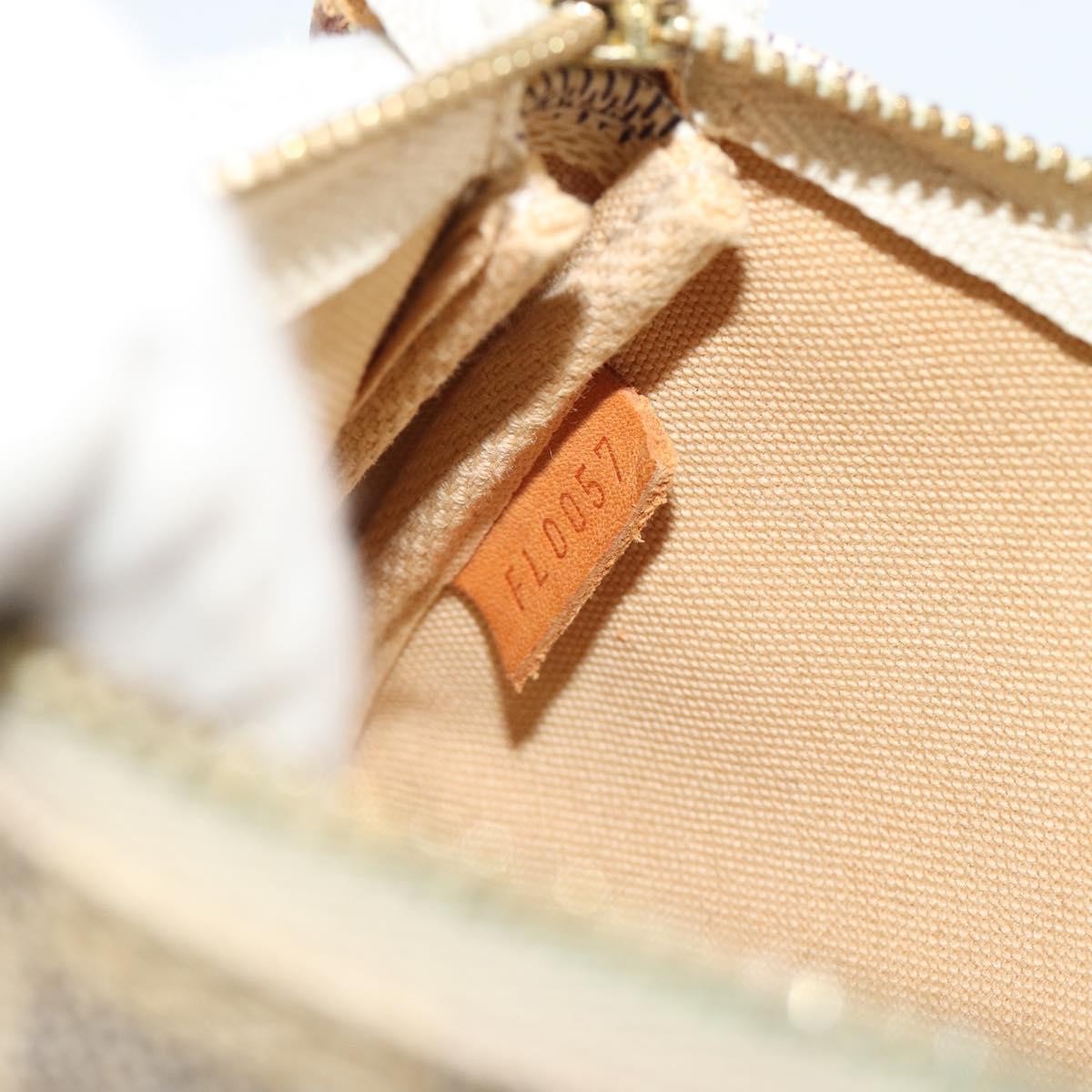 Louis Vuitton Mini Pochette Accessoires Damier Canvas Beige Canvas Clutche & Pouche Bag (Pre-Owned)