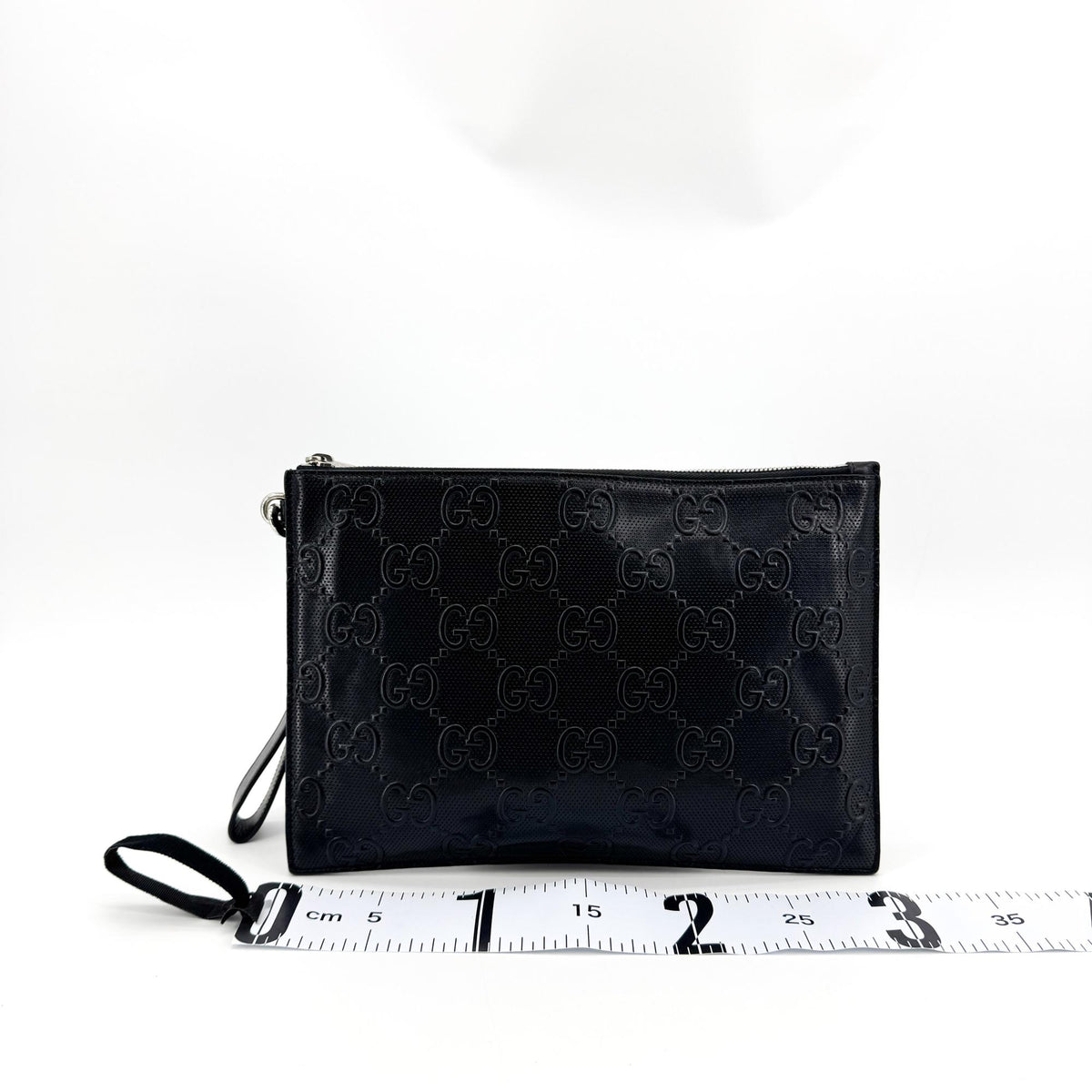 Gucci Wristlet Gg Embossed Perforated Leather Black Leather Clutche & Pouche Bag (Pre-Owned)